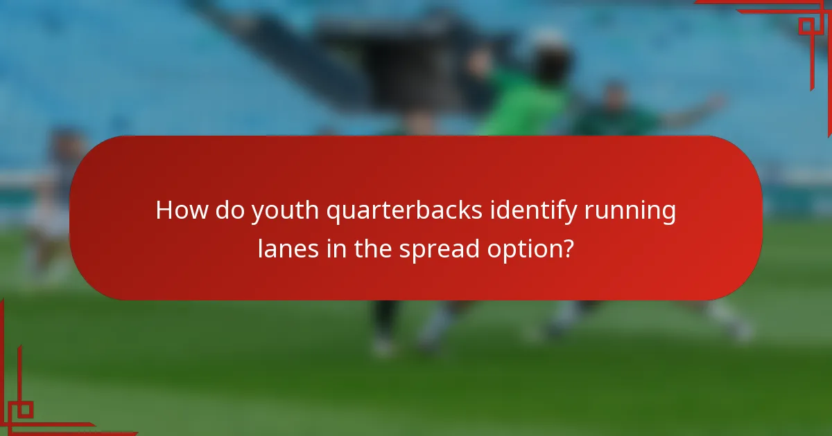 How do youth quarterbacks identify running lanes in the spread option?